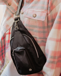 Solid Sling Bag with Striped Strap